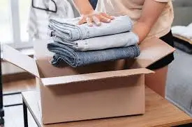 Clothes movers Mannheim packing wardrobe boxes